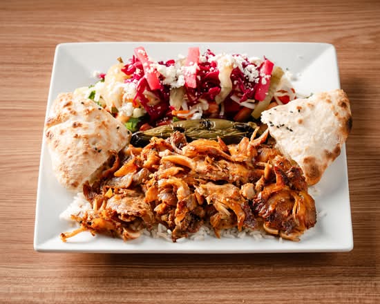Döner over rice with salad and warm flatbread